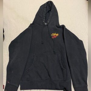 Obey Black Hoodie with Red and Yellow Logo